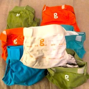 7 small g diapers. Gently used! Pouches look good!